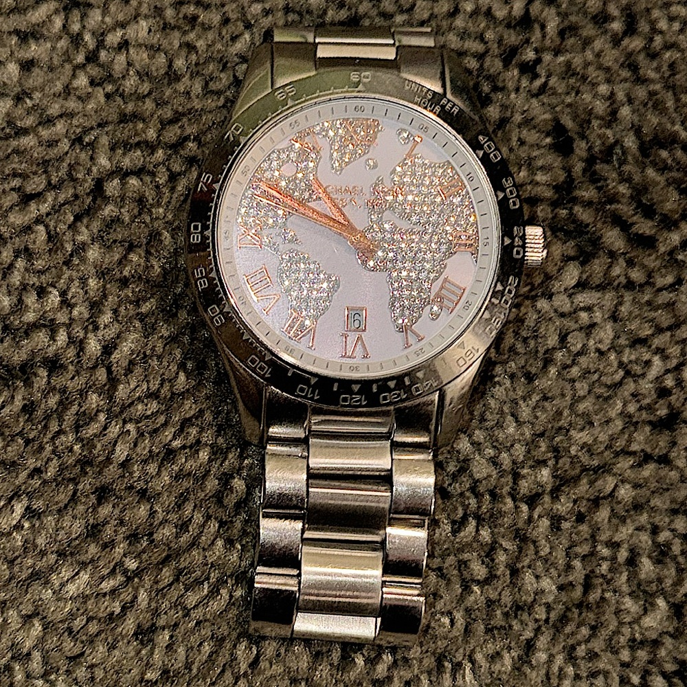 Michael Kors silver and rose gold world watch